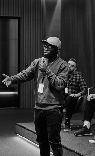 Facilitator speaking at an event
